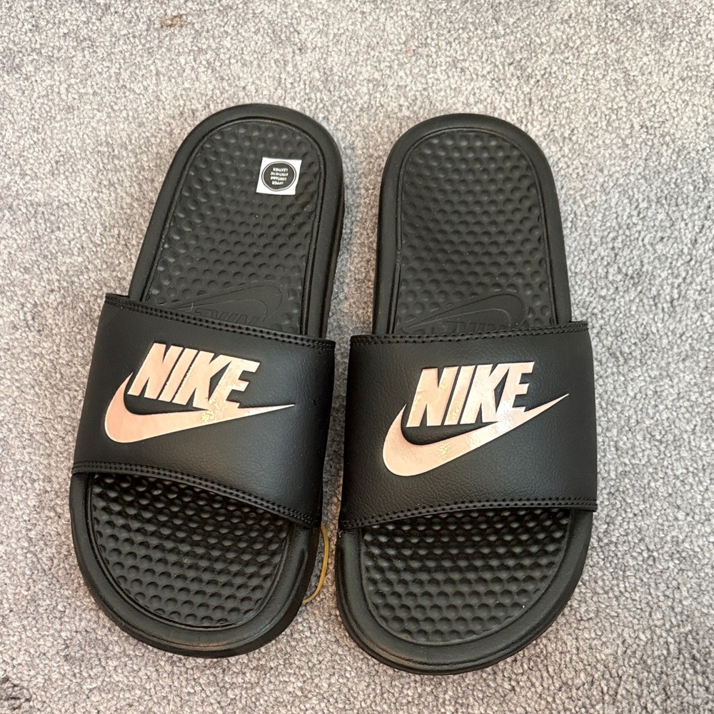 Nike Black Slides with Metallic Logo